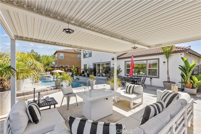 view of patio featuring an outdoor living space, an outdoor pool, and outdoor dining space