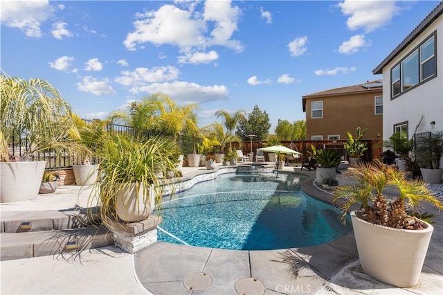 view of pool with a fenced in pool, a patio area, and fence