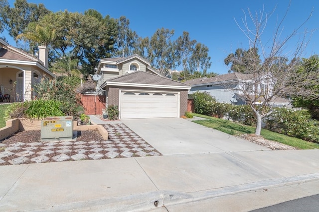 view of front facade with concrete driveway, an attached garage, and brick siding