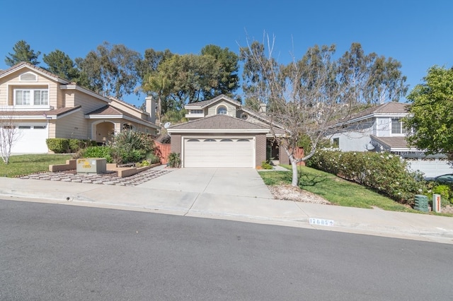 view of front facade featuring concrete driveway and a garage