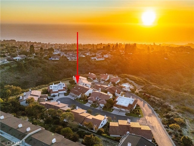 aerial view at dusk with a residential view