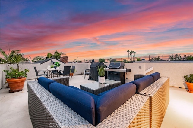 212 2nd St, Seal Beach, CA 90740 - patio terrace at dusk featuring an outdoor hangout area and area for grilling