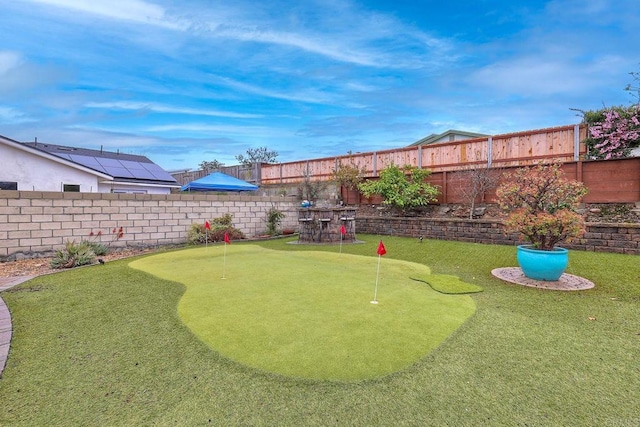 view of yard featuring a fenced backyard