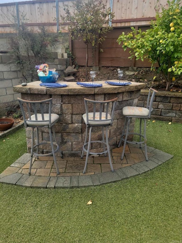 view of patio / terrace with outdoor dry bar