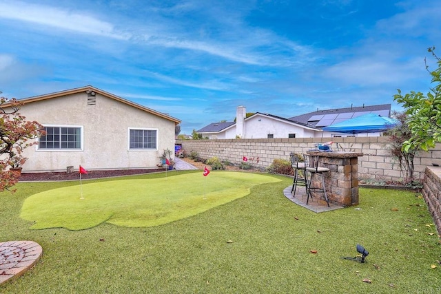 view of yard with a fenced backyard