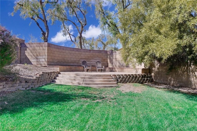 view of yard featuring a fenced backyard