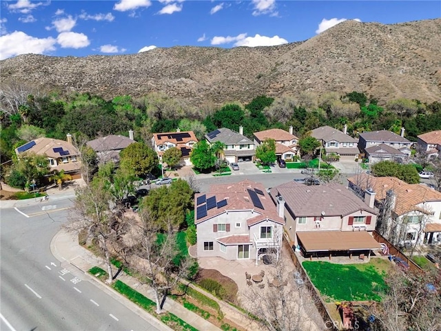 aerial view with a mountain view and a residential view