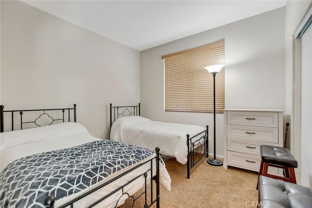 bedroom featuring baseboards