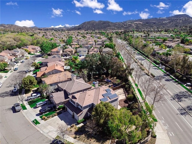 bird's eye view featuring a residential view and a mountain view