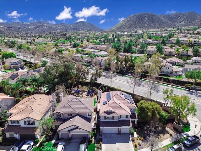 drone / aerial view featuring a mountain view and a residential view