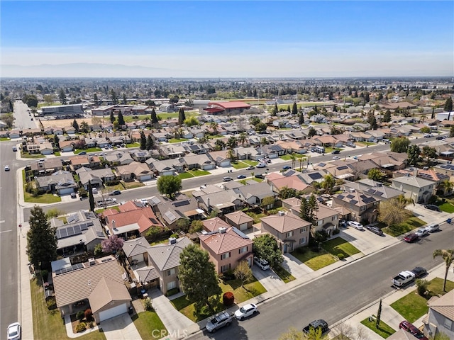 birds eye view of property with a residential view