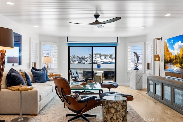 living room with recessed lighting, a ceiling fan, and wood finished floors