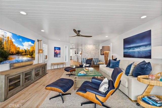 living room with recessed lighting, a ceiling fan, and wood finished floors