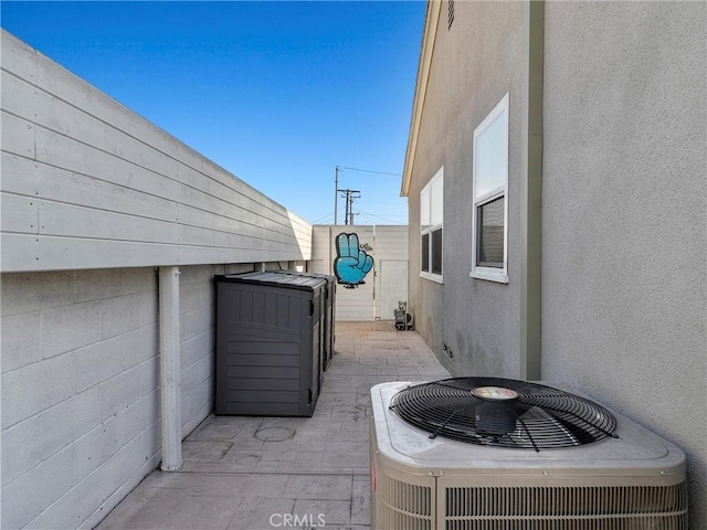 view of patio featuring central air condition unit