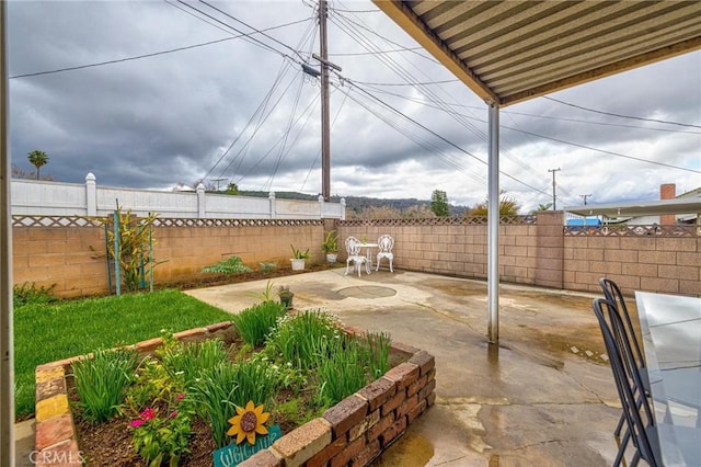 view of patio / terrace with a fenced backyard