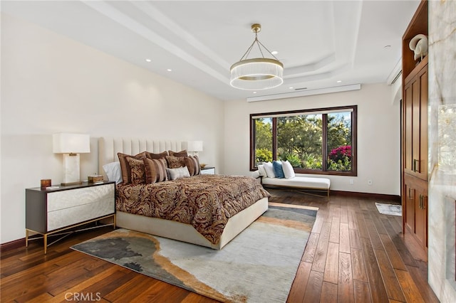 3221 Integrity Way, Fallbrook, CA 92028 - bedroom featuring a tray ceiling, dark wood-style flooring, baseboards, and recessed lighting