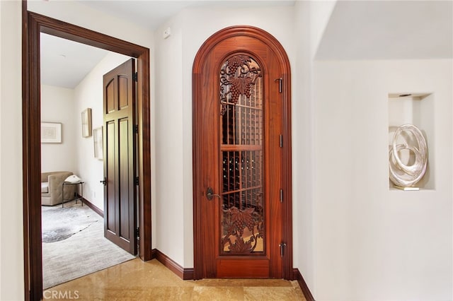 3221 Integrity Way, Fallbrook, CA 92028 - wine cellar with arched walkways and baseboards