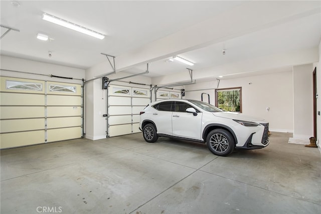 garage with baseboards