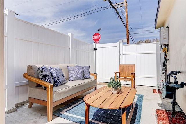 view of patio featuring a fenced backyard and an outdoor hangout area