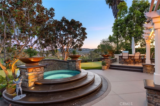 10 Corte Vizcaya, San Clemente, CA 92673 - view of patio / terrace featuring a putting green, outdoor dining area, and an in-ground hot tub