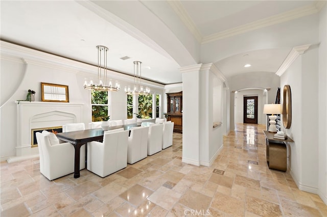 10 Corte Vizcaya, San Clemente, CA 92673 - dining room with arched walkways, stone tile flooring, healthy amount of natural light, decorative columns, and ornamental molding