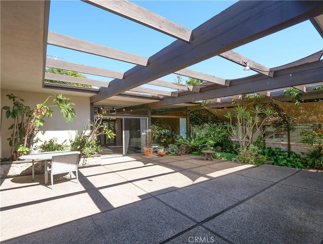 view of patio / terrace featuring outdoor dining space and a pergola