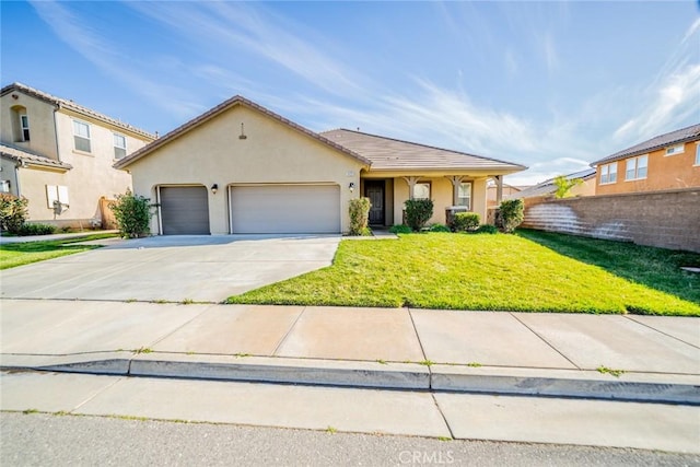 view of front of property with stucco siding, driveway, a front yard, and an attached garage