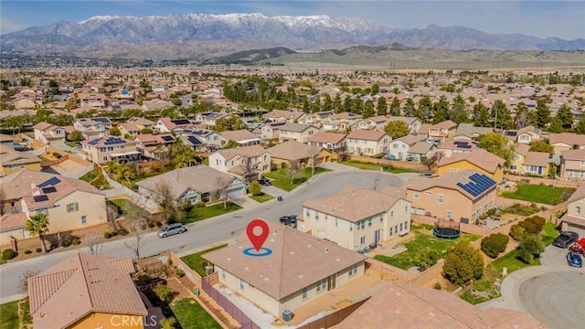 bird's eye view featuring a residential view and a mountain view