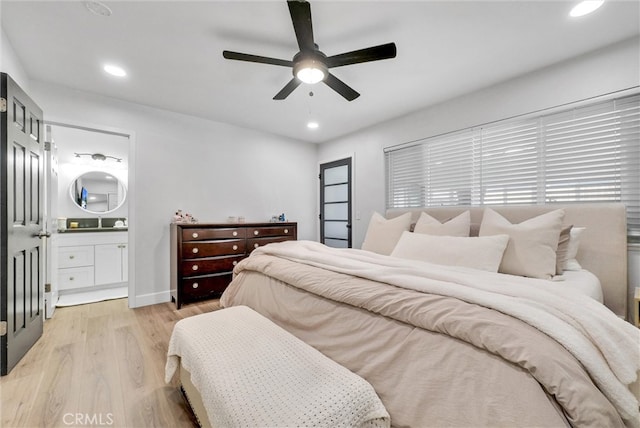 bedroom featuring recessed lighting, connected bathroom, light wood-style floors, and ceiling fan