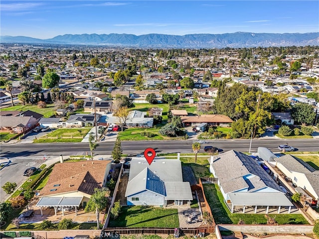 bird's eye view with a mountain view and a residential view