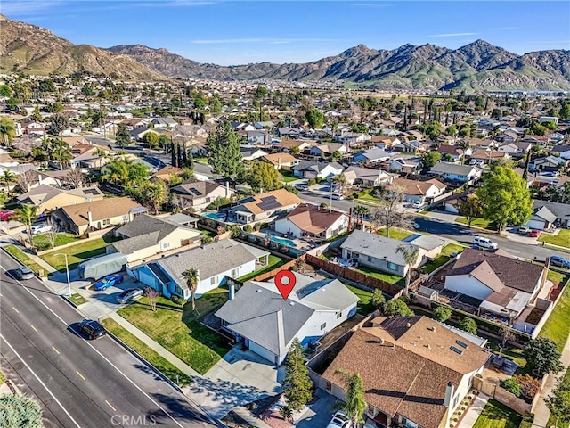 bird's eye view featuring a mountain view and a residential view