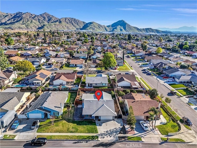 drone / aerial view featuring a mountain view and a residential view