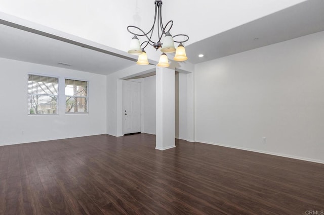 interior space with visible vents, dark wood-type flooring, baseboards, a chandelier, and recessed lighting