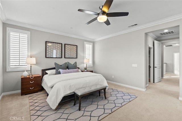 bedroom with visible vents, light colored carpet, and baseboards