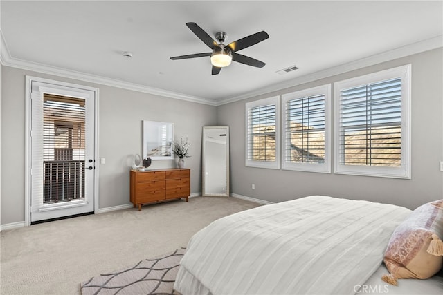 carpeted bedroom featuring access to exterior, crown molding, visible vents, and baseboards