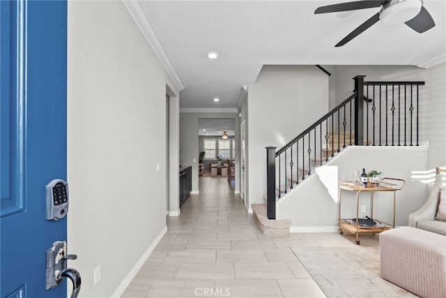 foyer with crown molding, baseboards, ceiling fan, stairs, and recessed lighting