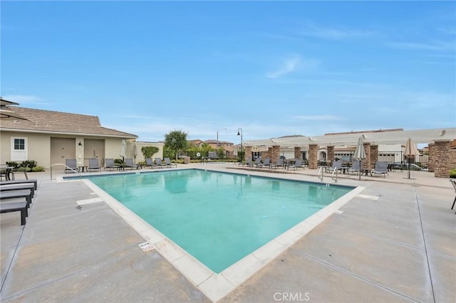 pool featuring a patio area