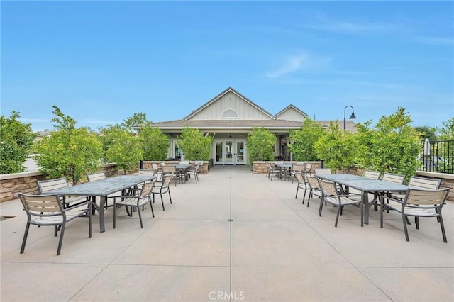 view of patio with french doors and outdoor dining area