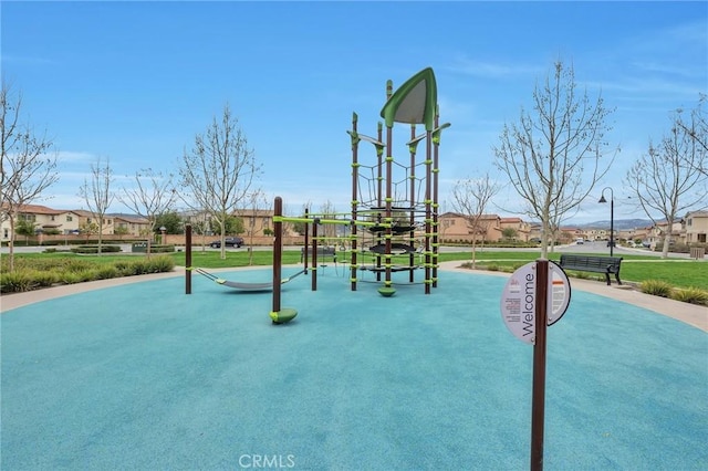 communal playground with a residential view