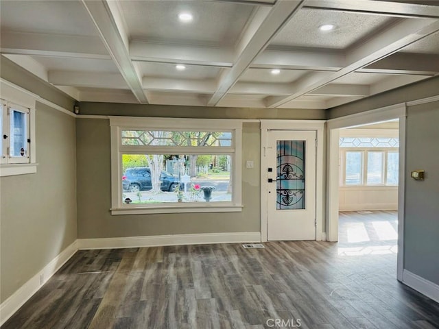 entryway featuring dark wood finished floors, plenty of natural light, coffered ceiling, and baseboards