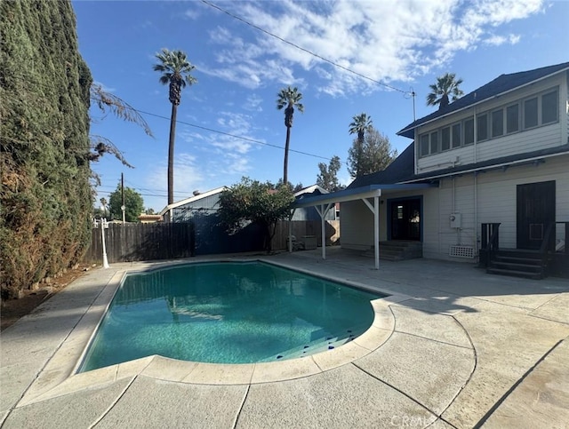 view of pool with a fenced in pool, a patio, and a fenced backyard