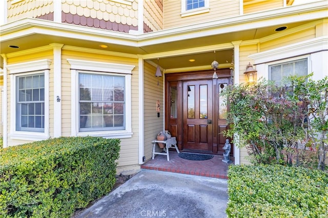 property entrance with mansard roof
