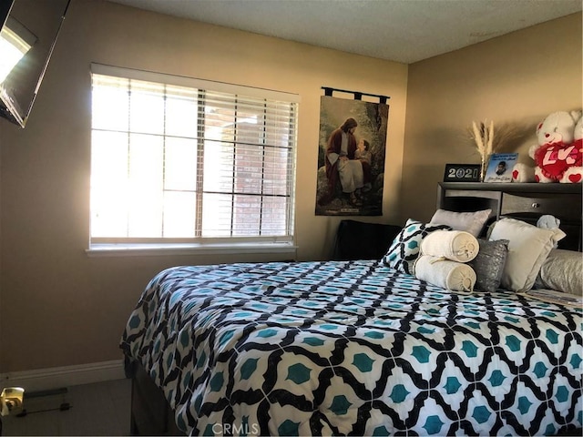 bedroom with baseboards