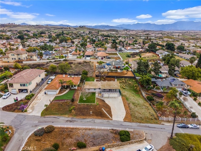 aerial view with a mountain view and a residential view