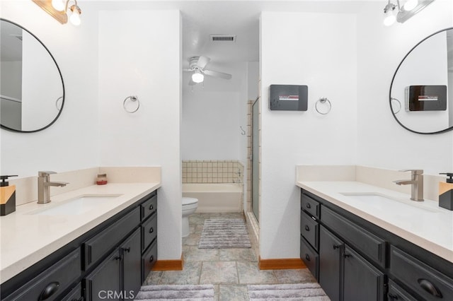 bathroom with a sink, visible vents, walk in shower, and ceiling fan