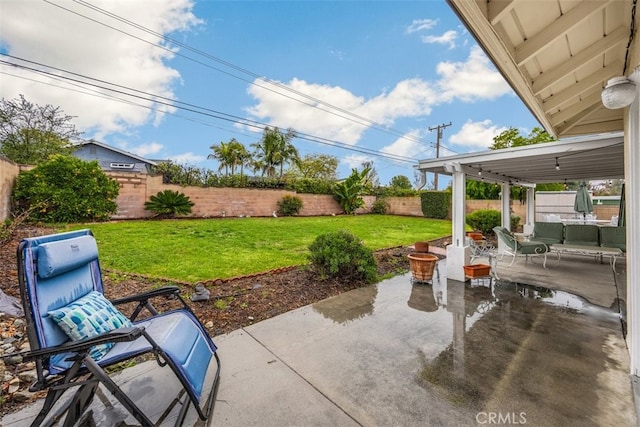 view of patio / terrace featuring an outdoor living space and a fenced backyard