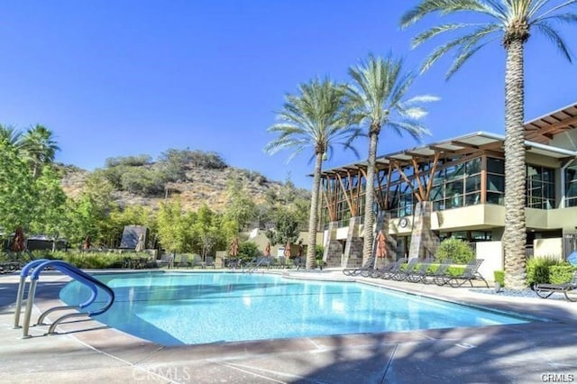 pool with a patio area