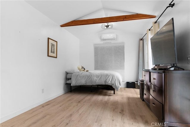 bedroom featuring baseboards, lofted ceiling with beams, and light wood-style flooring