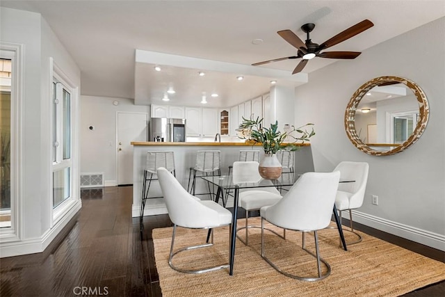 dining area with visible vents, dark wood-type flooring, baseboards, ceiling fan, and recessed lighting