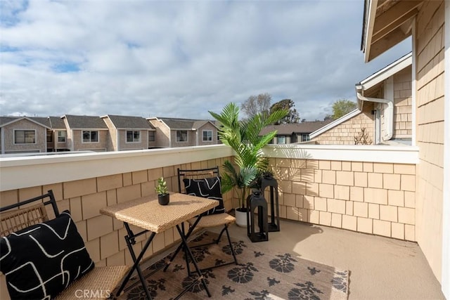 balcony featuring a residential view